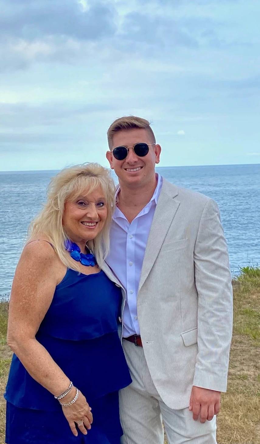 Oceanfront cliff family portrait at a Hamptons summer wedding